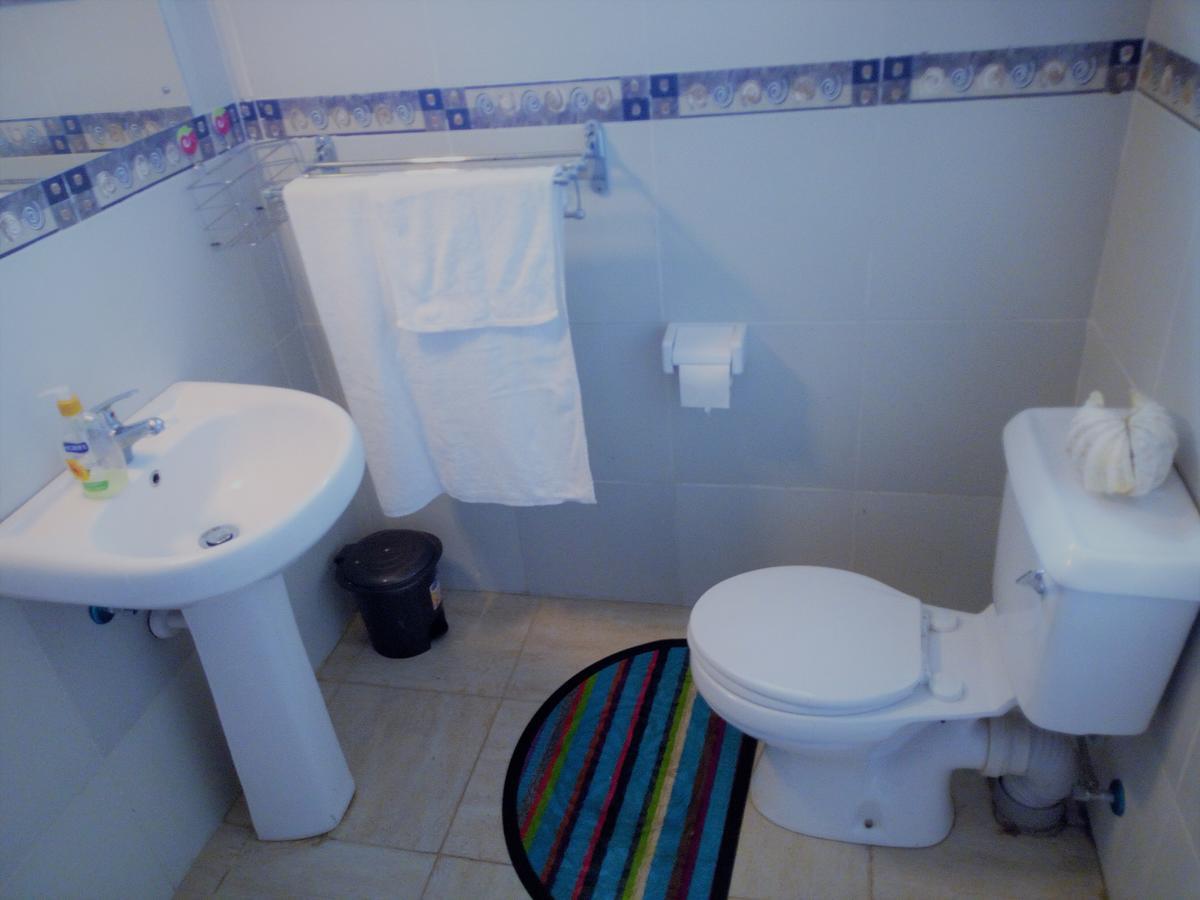 Sea Breeze Villas Kenya Diani Beach Bagian luar foto