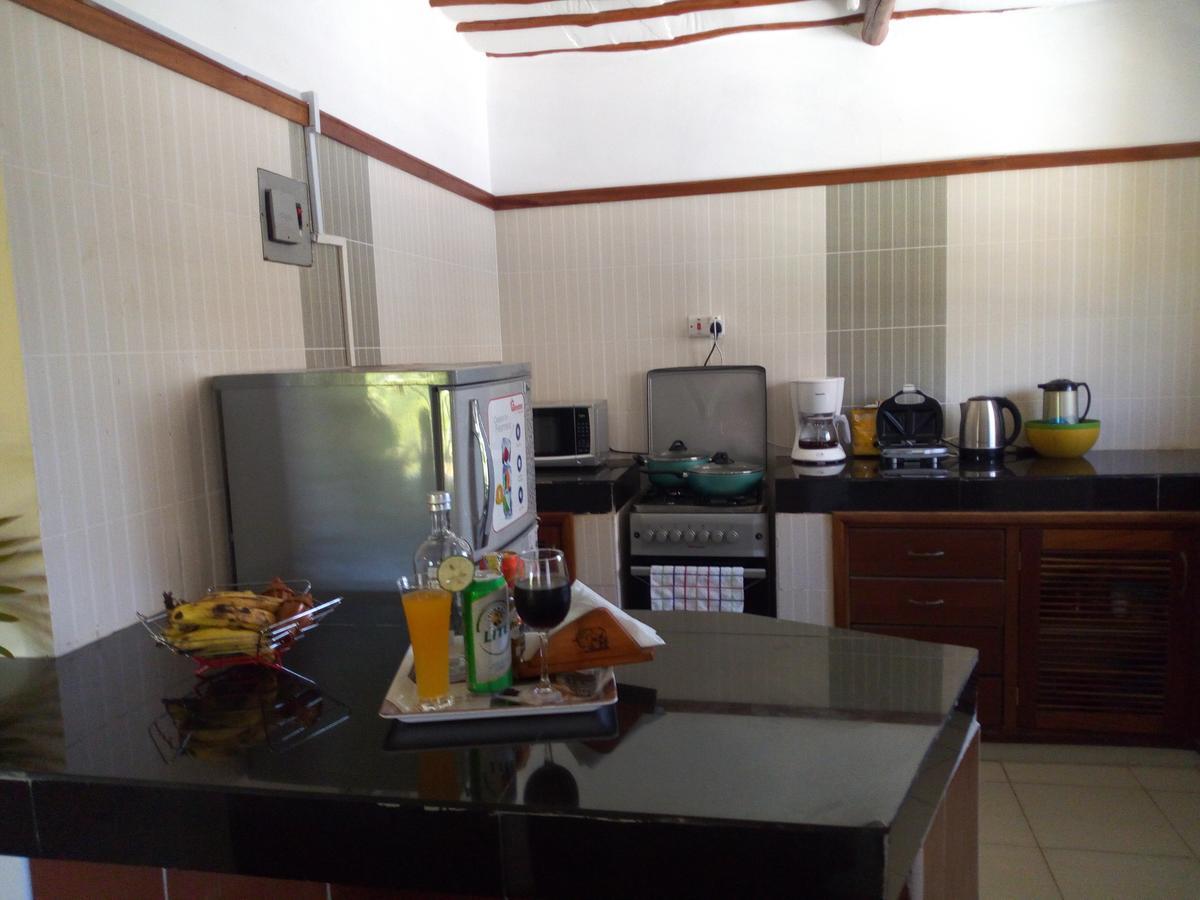 Sea Breeze Villas Kenya Diani Beach Bagian luar foto