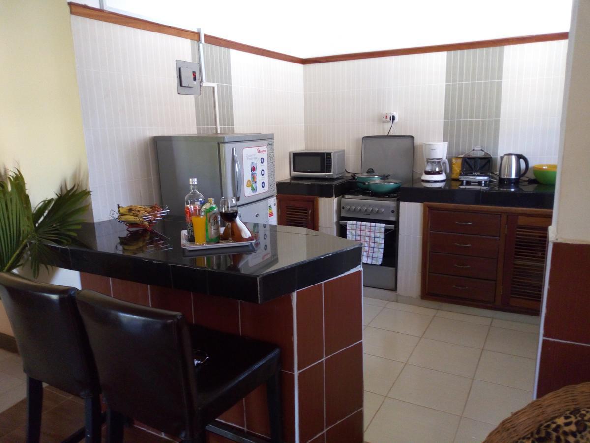 Sea Breeze Villas Kenya Diani Beach Bagian luar foto